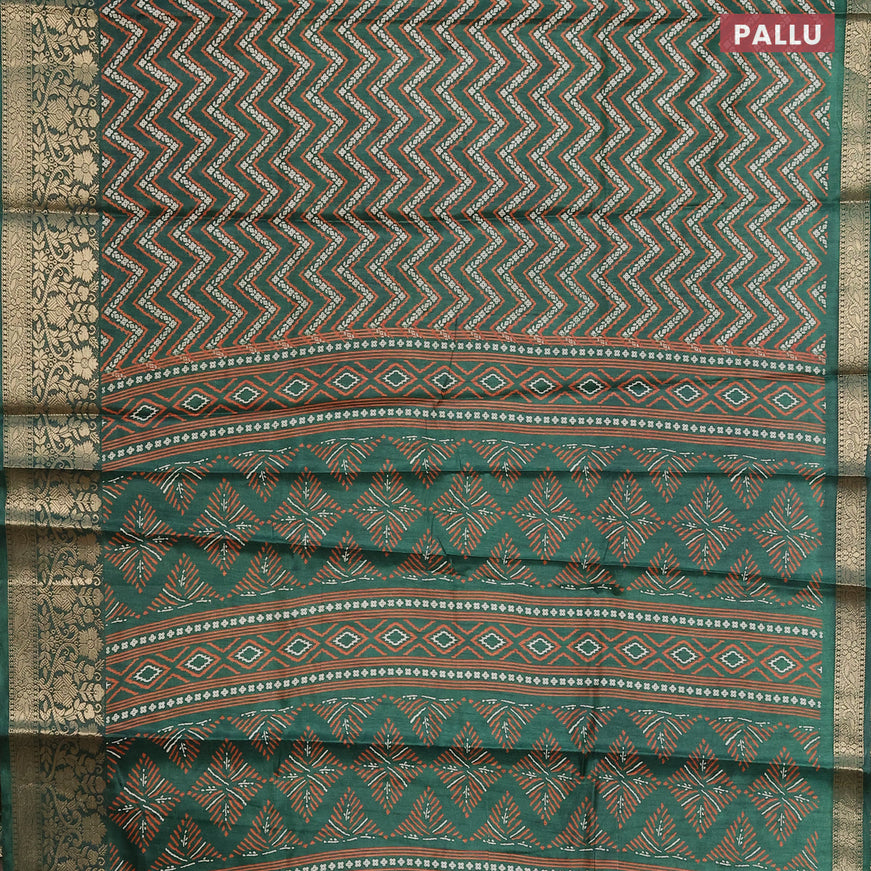 Semi dola saree green with allover zig zag prints and zari woven border