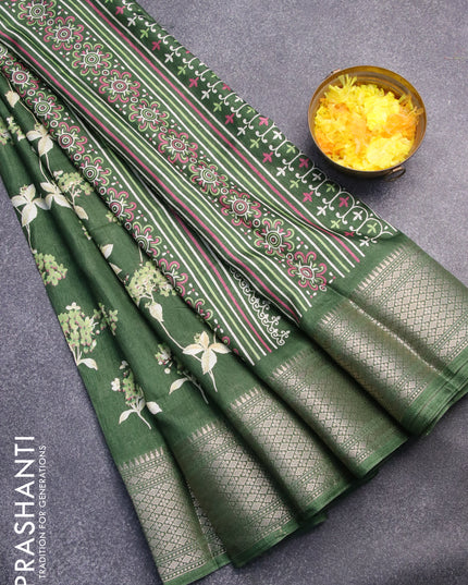 Semi dola saree green with allover floral ptrints and zari woven border