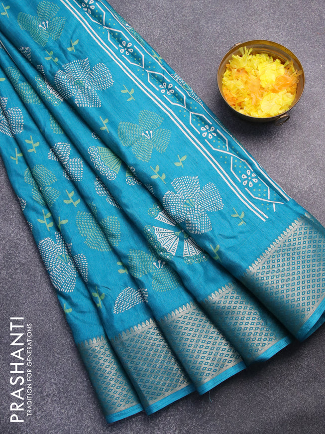 Semi dola saree teal blue with allover prints and zari woven border