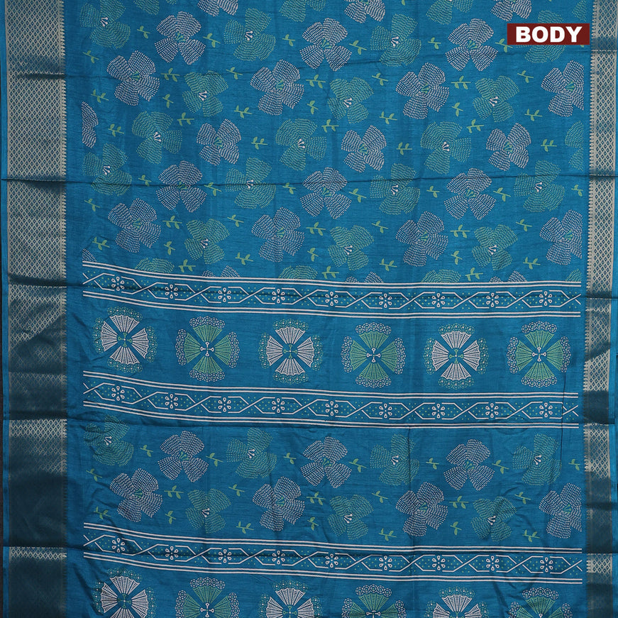 Semi dola saree teal blue with allover prints and zari woven border