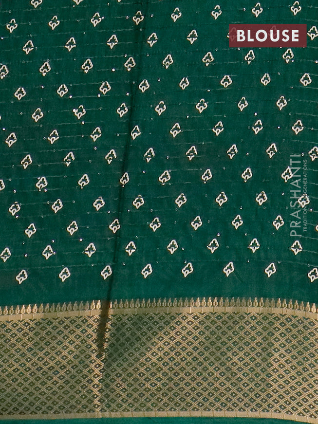 Semi dola saree green with allover leaf prints & sequin work and zari woven border