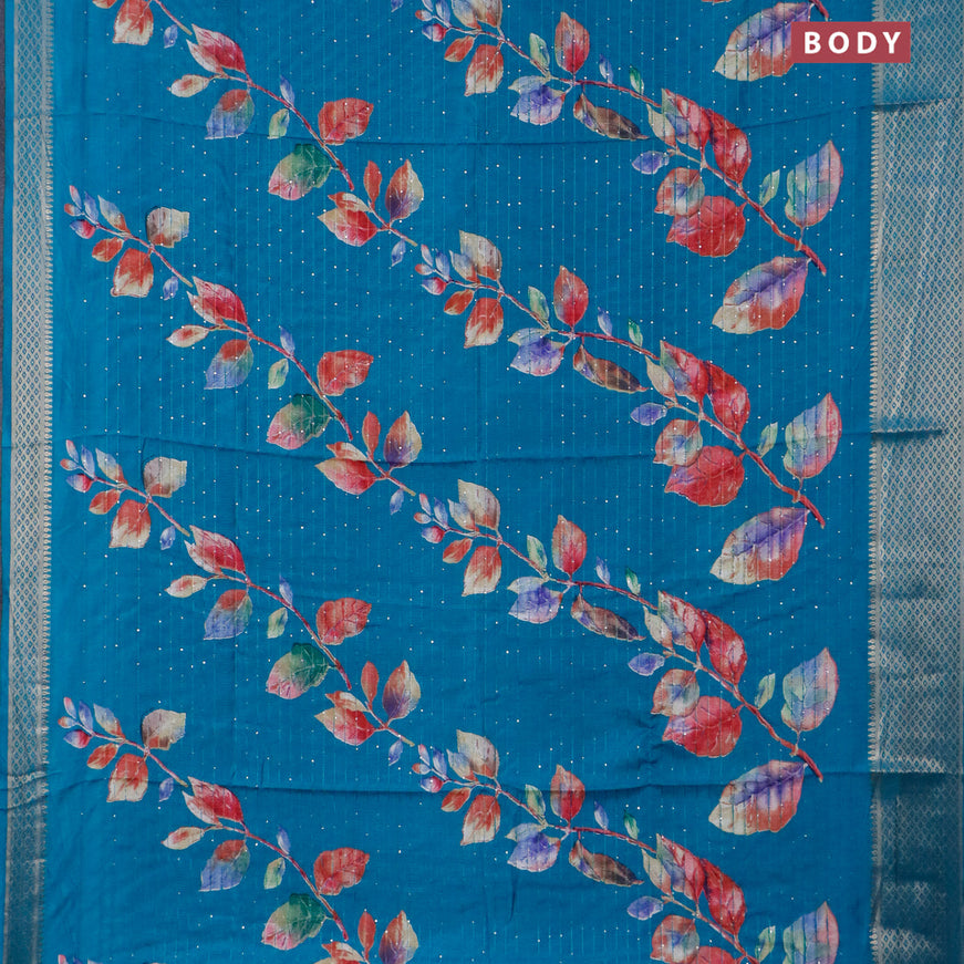 Semi dola saree teal blue with allover leaf prints & sequin work and zari woven border