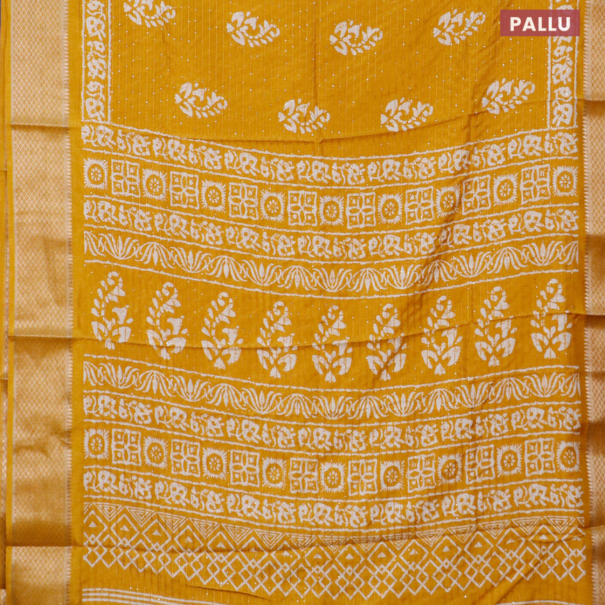 Semi dola saree mustard yellow with batik prints & sequin work and zari woven border