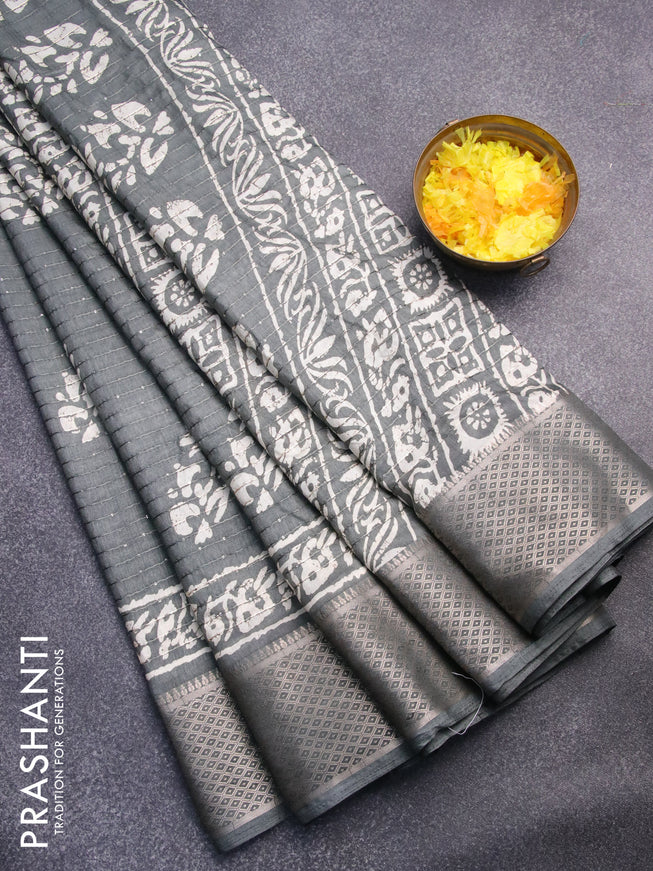 Semi dola saree grey with batik prints & sequin work and zari woven border
