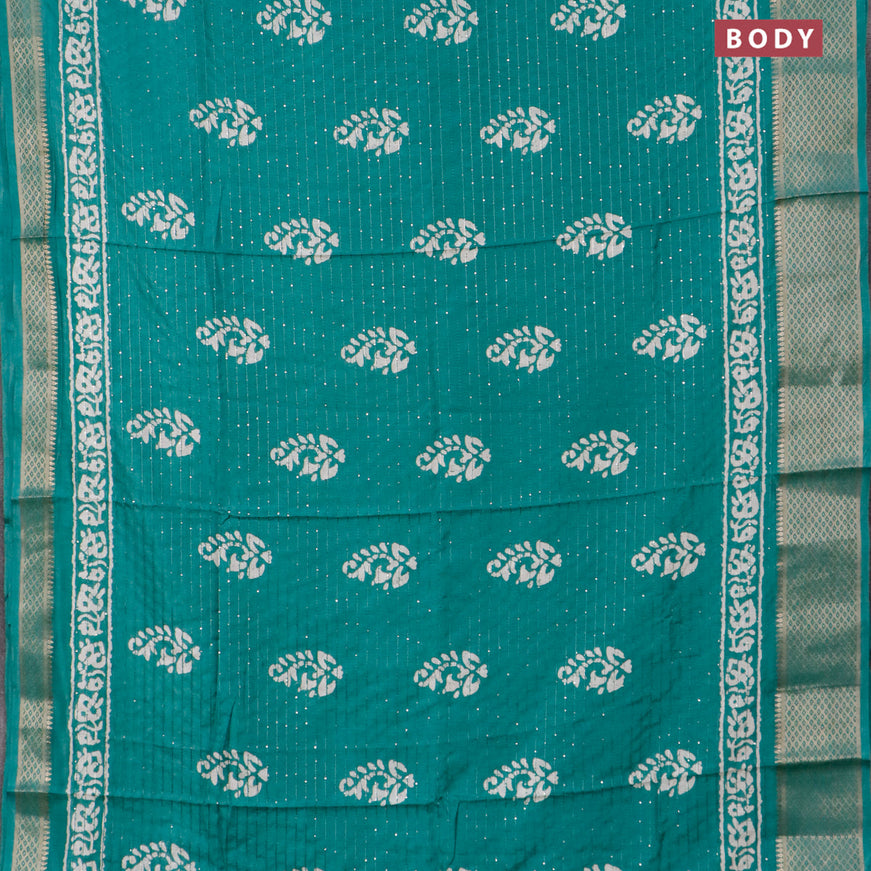 Semi dola saree teal green with batik prints & sequin work and zari woven border
