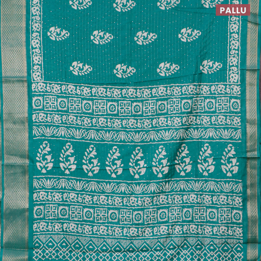 Semi dola saree teal green with batik prints & sequin work and zari woven border