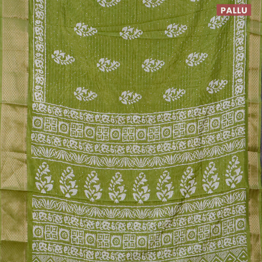 Semi dola saree light green with batik prints & sequin work and zari woven border