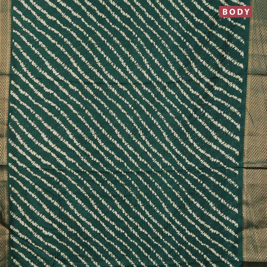 Semi dola saree green with allover shibori prints & sequin work and zari woven border