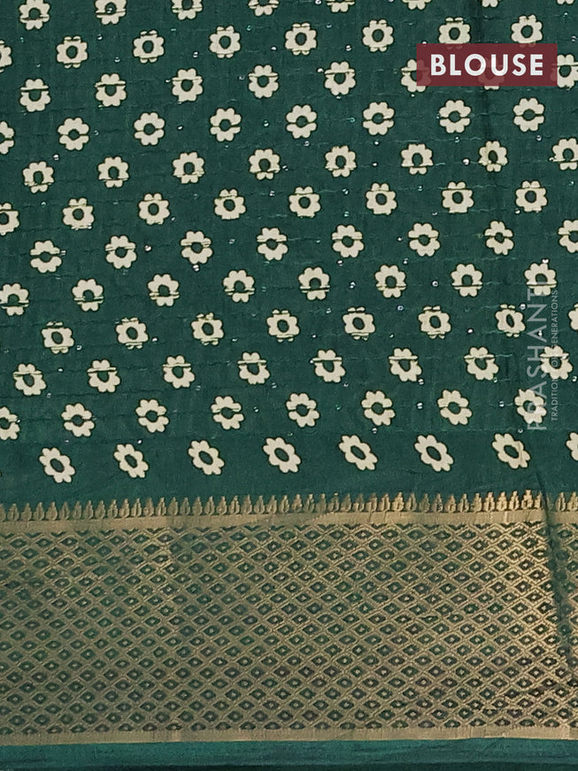 Semi dola saree green with allover shibori prints & sequin work and zari woven border