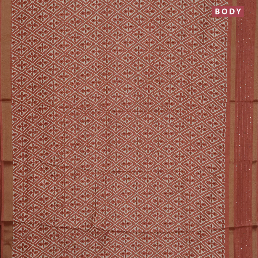 Semi dola saree peach shade with allover prints and zari woven sequin work border