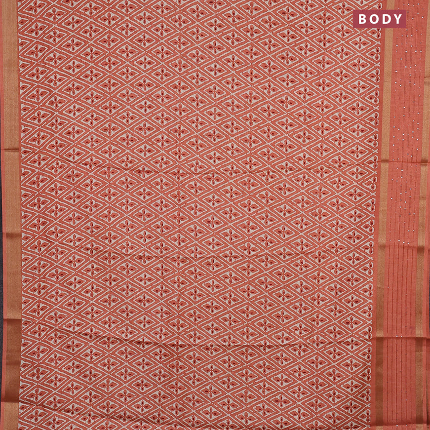 Semi dola saree peach orange with allover prints and zari woven sequin work border