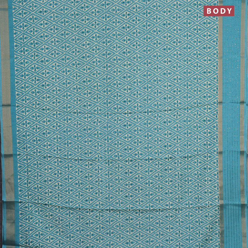 Semi dola saree teal blue with allover prints and zari woven sequin work border