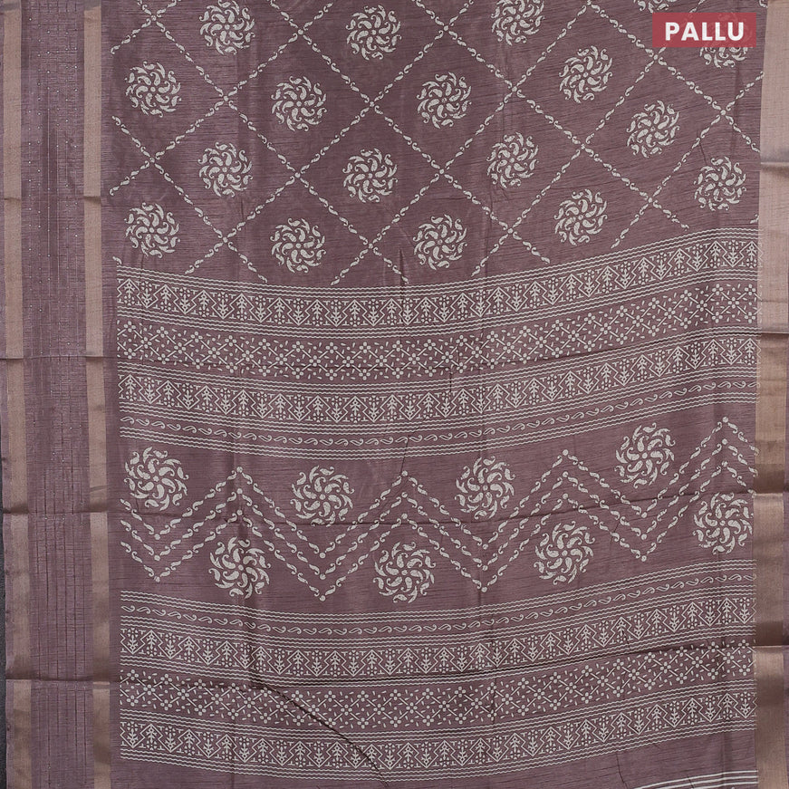 Semi dola saree grey shade with allover batik prints and zari woven sequin work border