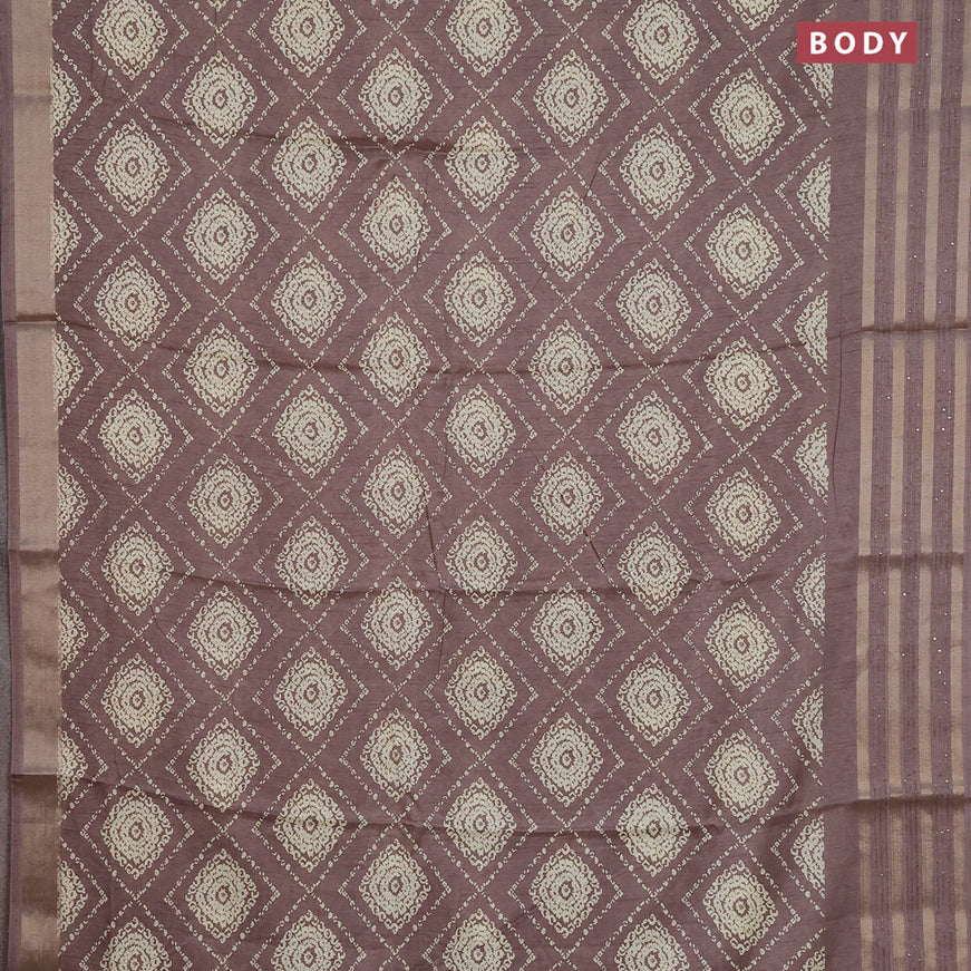 Semi dola saree pastel brown with allover prints and zari woven sequin work border
