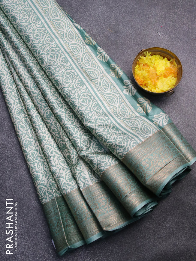 Semi dola saree off white and pastel green with allover prints and zari woven border