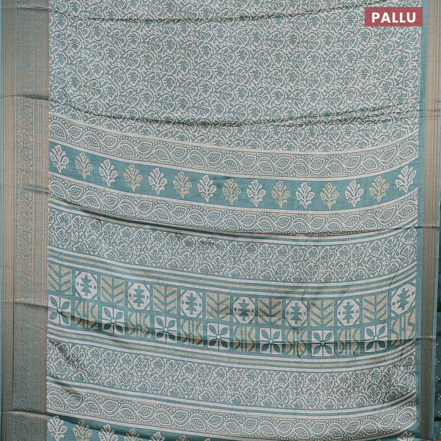 Semi dola saree off white and pastel green with allover prints and zari woven border