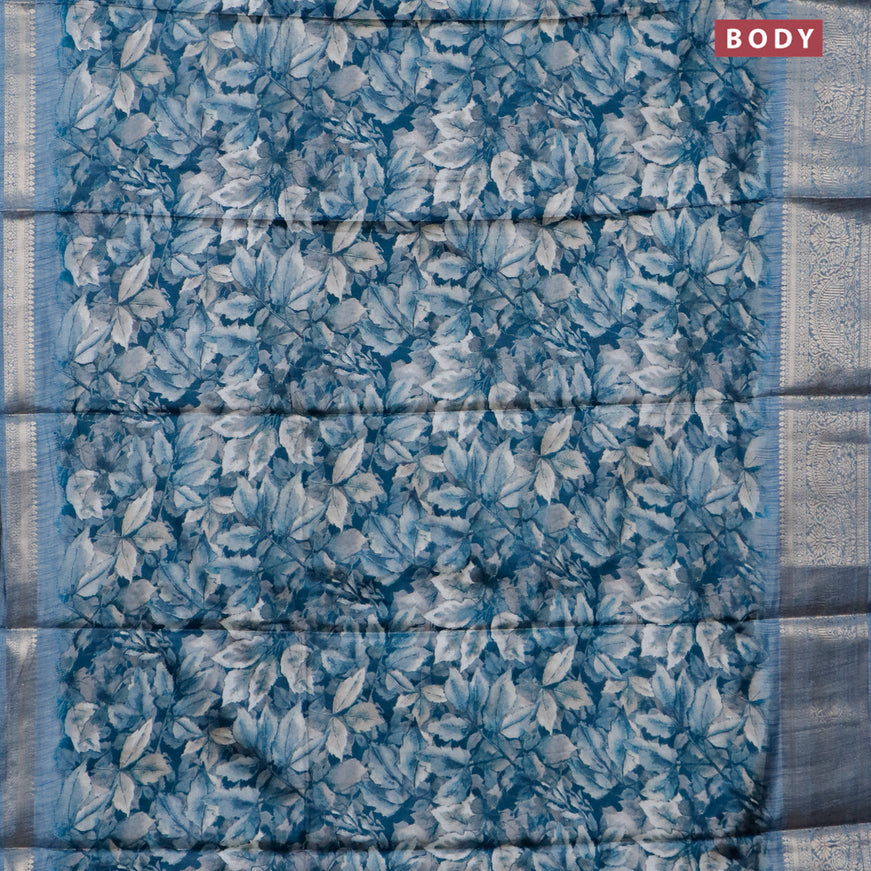 Semi dola saree peacock blue shade with allover leaf prints and zari woven border