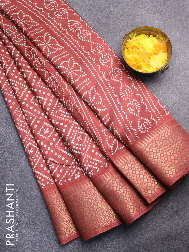 Semi dola saree rustic brown with allover bandhani prints and zari woven border