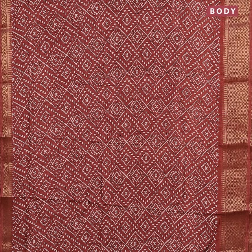 Semi dola saree rustic brown with allover bandhani prints and zari woven border