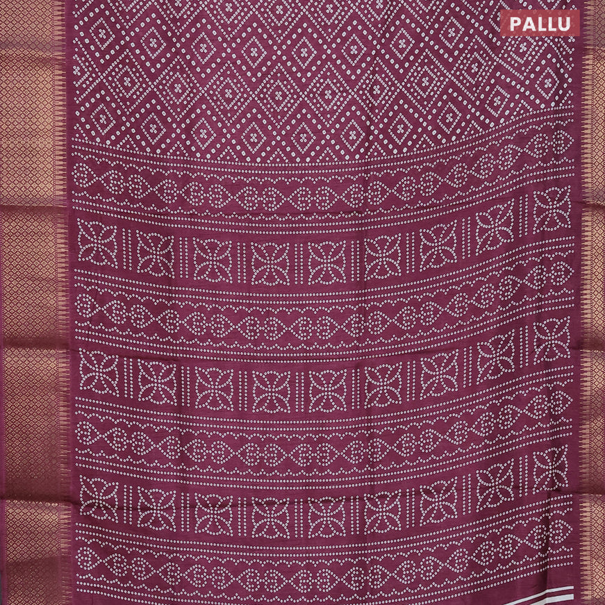 Semi dola saree wine shade with allover bandhani prints and zari woven border