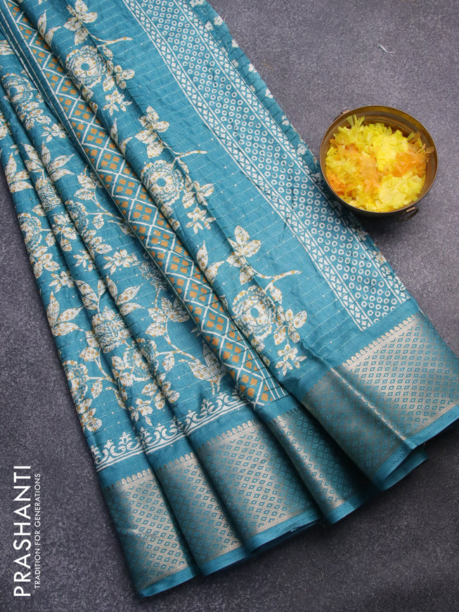 Semi dola saree teal blue shade with allover floral prints & sequin work and zari woven border
