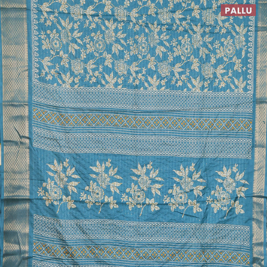 Semi dola saree teal blue shade with allover floral prints & sequin work and zari woven border