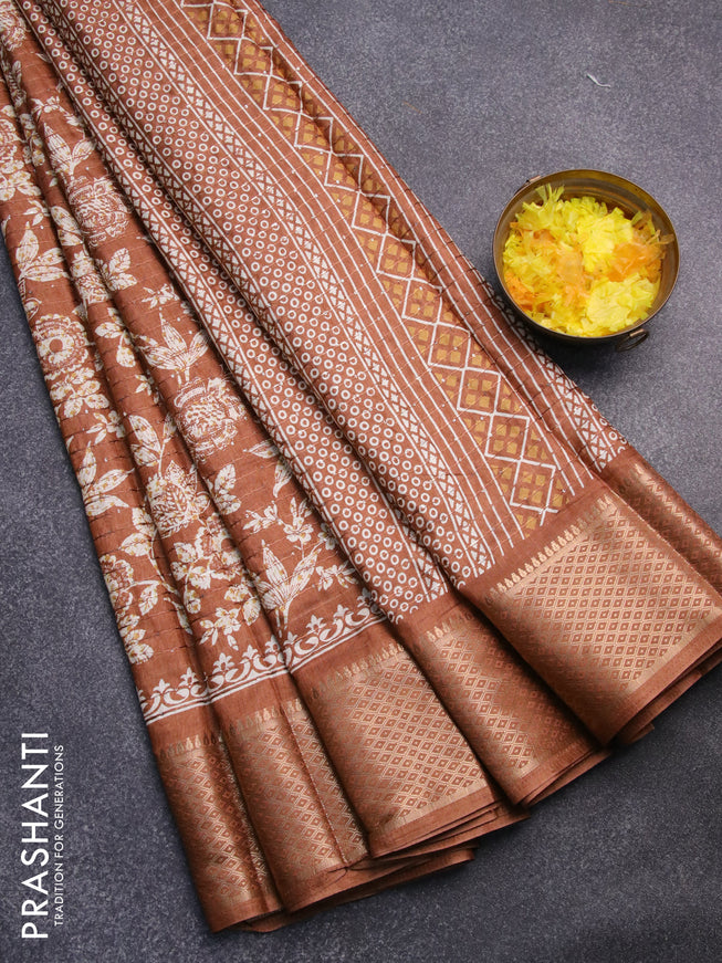 Semi dola saree rust shade with allover floral prints & sequin work and zari woven border
