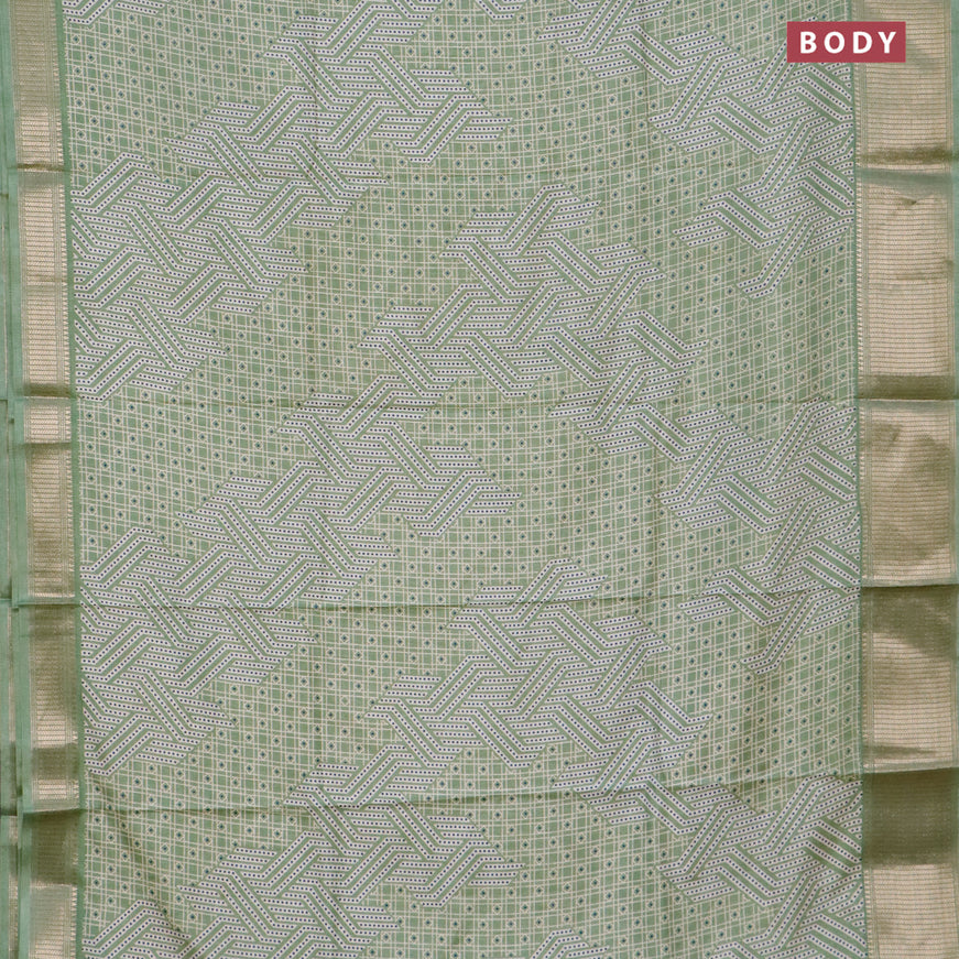 Semi dola saree pastel green with allover geometric prints and zari woven border