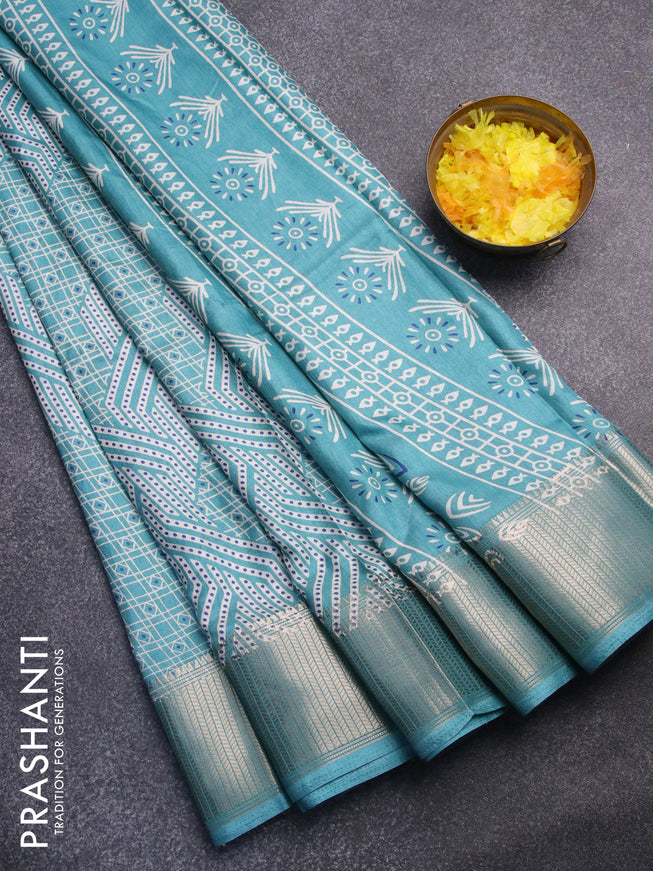 Semi dola saree teal blue with allover geometric prints and zari woven border