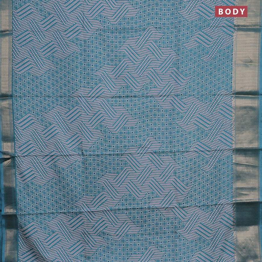 Semi dola saree teal blue with allover geometric prints and zari woven border