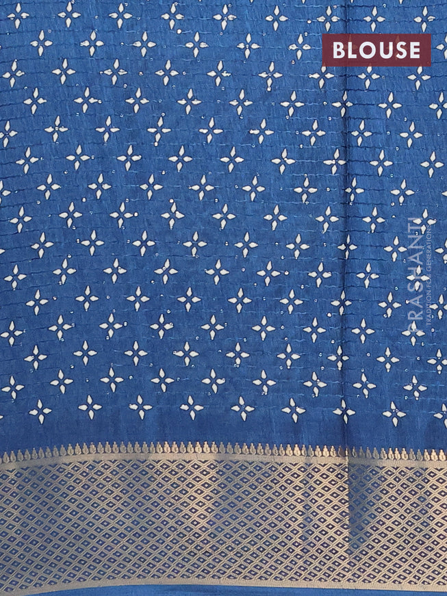 Semi dola saree peacock blue with allover prints & sequin work and zari woven border