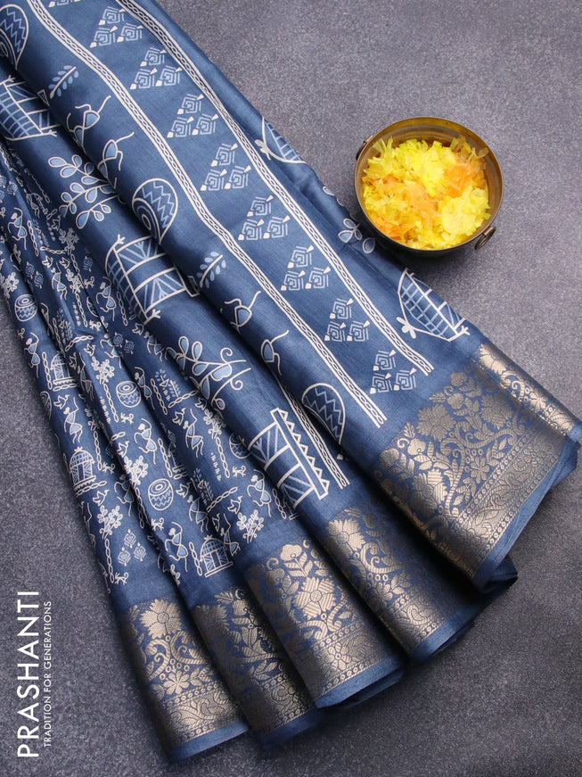 Semi dola saree blue shade with allover warli prints and zari woven border