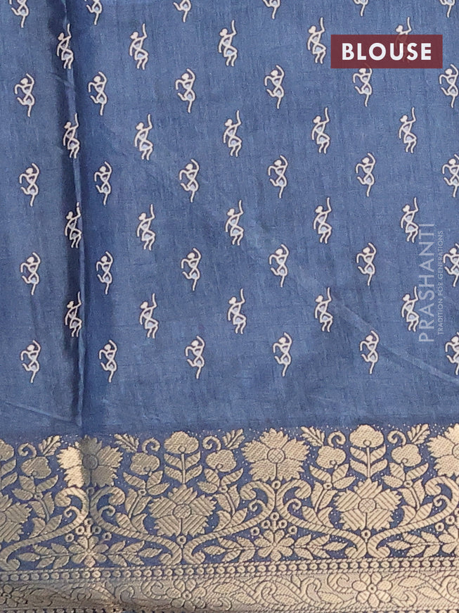 Semi dola saree blue shade with allover warli prints and zari woven border
