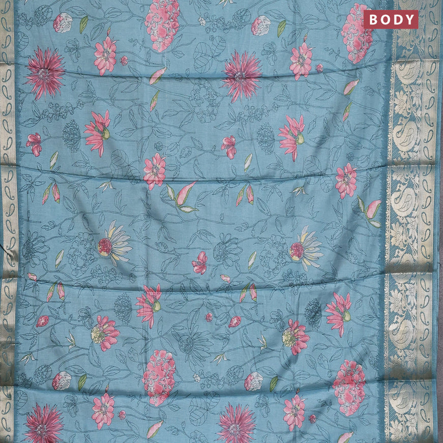 Semi dola saree pastel blue with allover floral prints and zari woven border