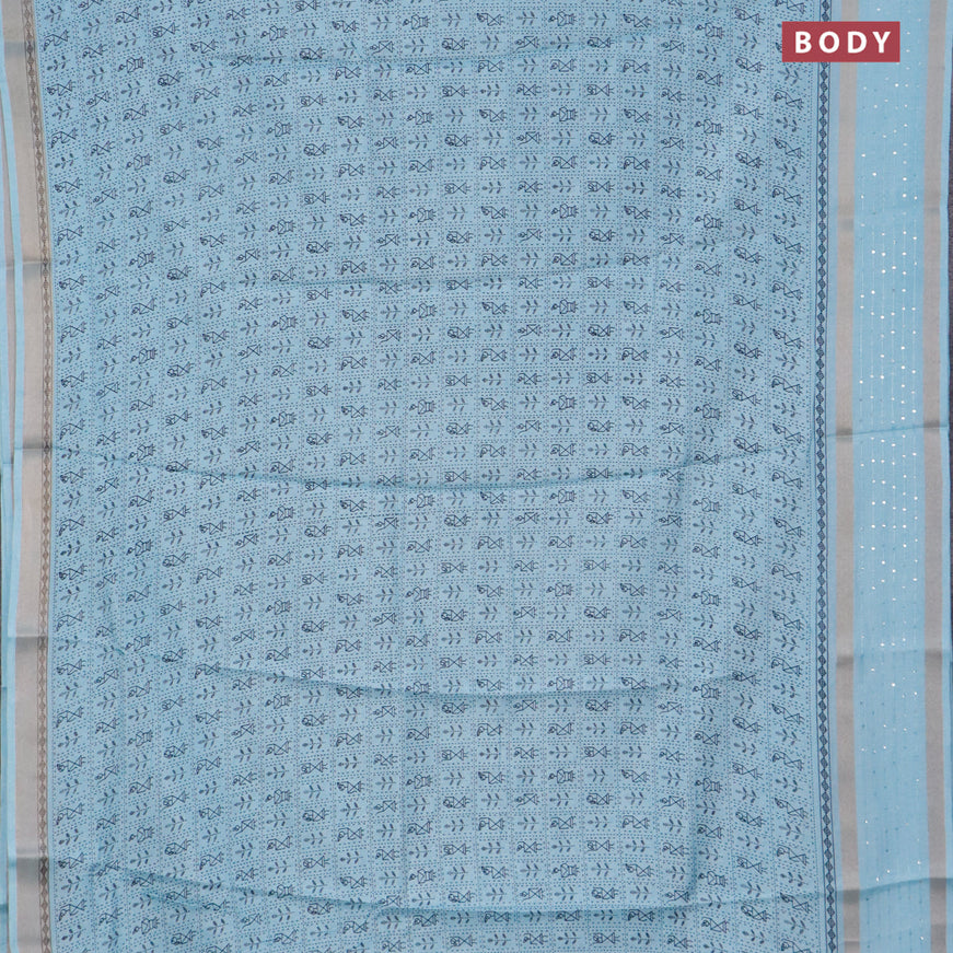 Semi dola saree teal blue with allover warli prints and zari woven sequin work border