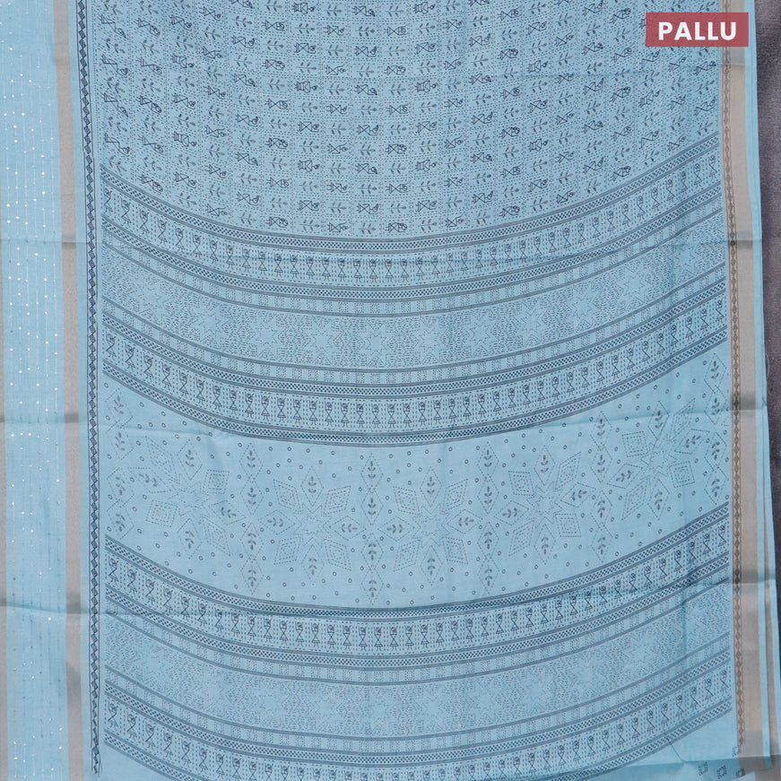 Semi dola saree teal blue with allover warli prints and zari woven sequin work border