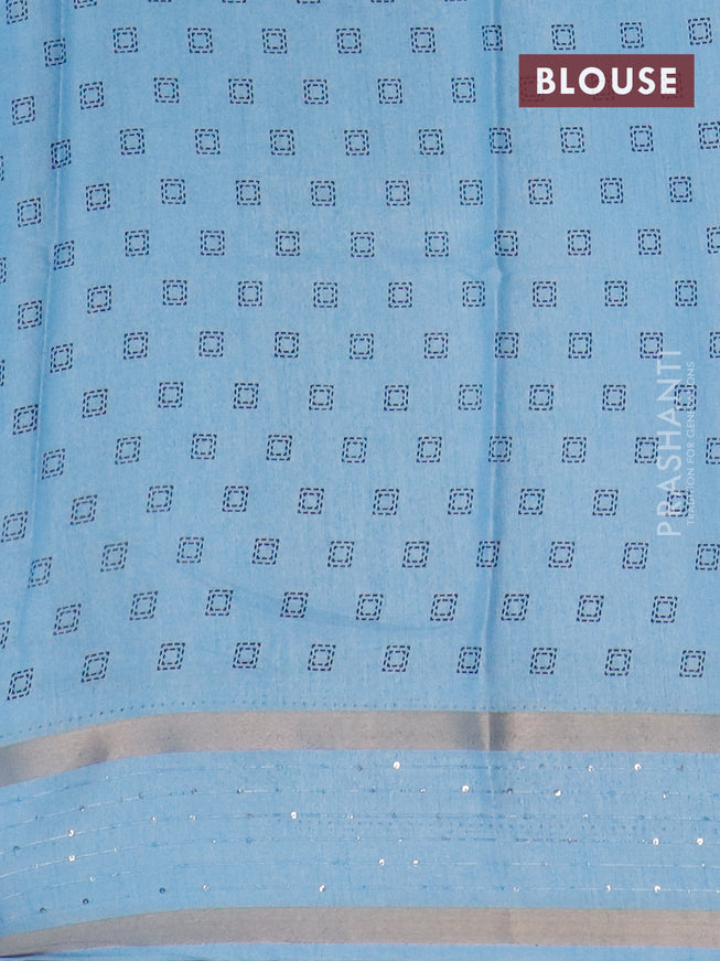 Semi dola saree light blue with allover warli prints and zari woven sequin work border