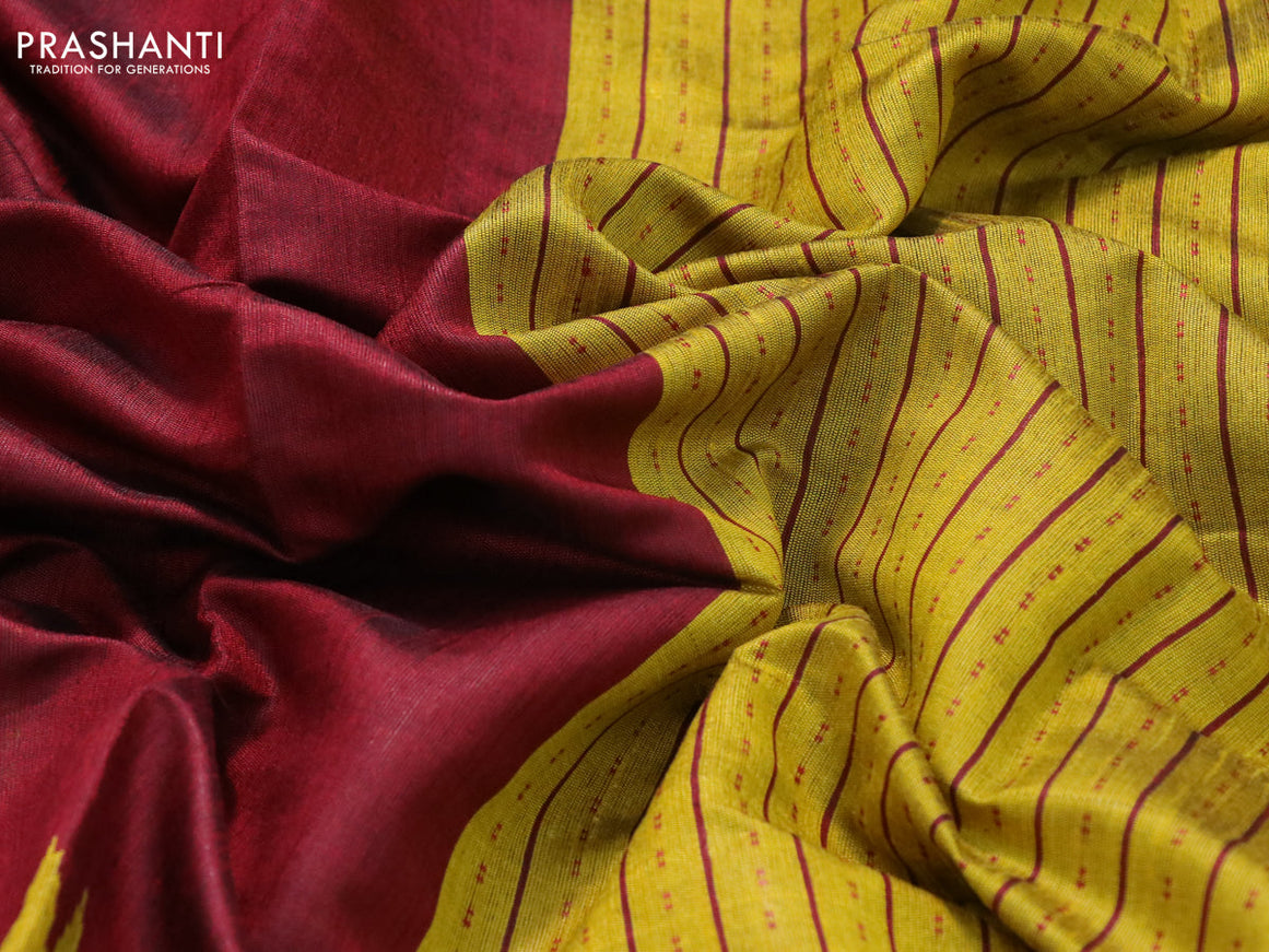 Dupion silk saree maroon and yellow with plain body and temple design thread woven border