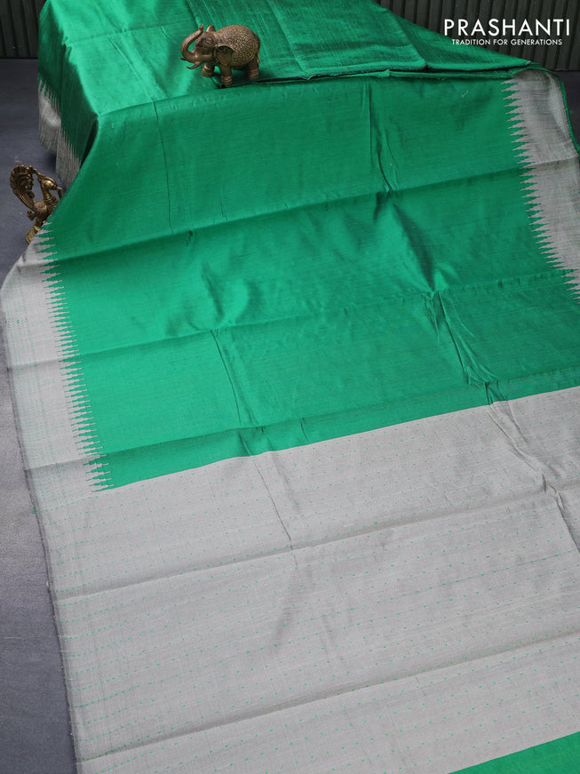 Dupion silk saree green and grey with plain body and temple design thread woven border