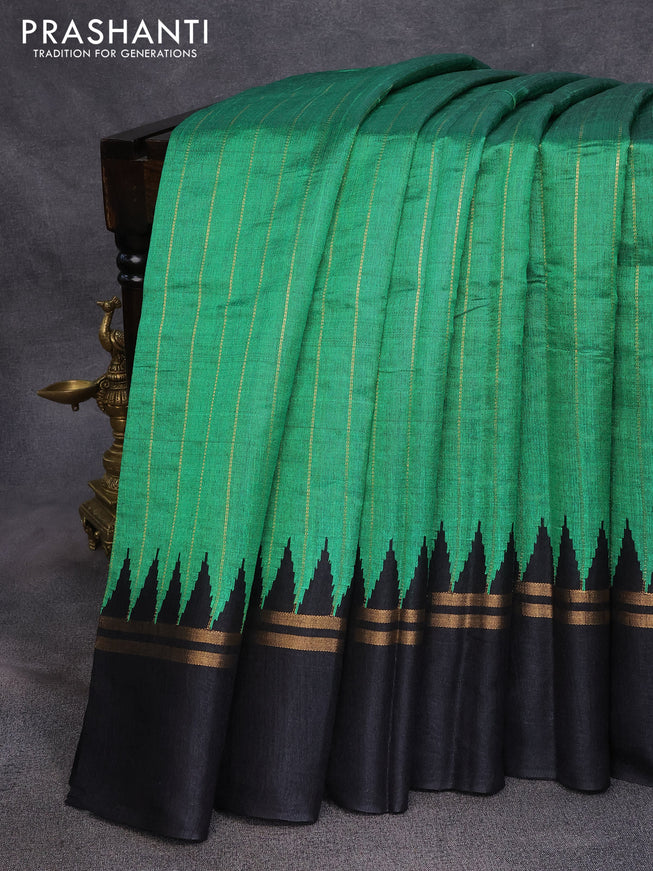 Dupion silk saree green and black with allover zari stripe weaves and temple design zari woven simple border
