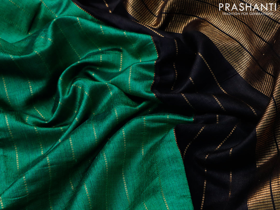 Dupion silk saree green and black with allover zari stripe weaves and temple design zari woven simple border