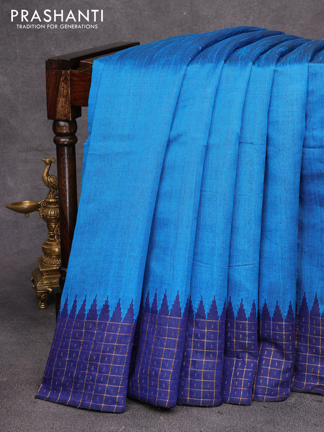 Dupion silk saree cs blue and blue with plain body and temple design zari checked border