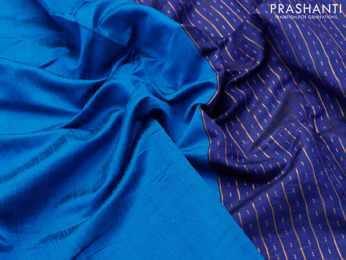 Dupion silk saree cs blue and blue with plain body and temple design zari checked border