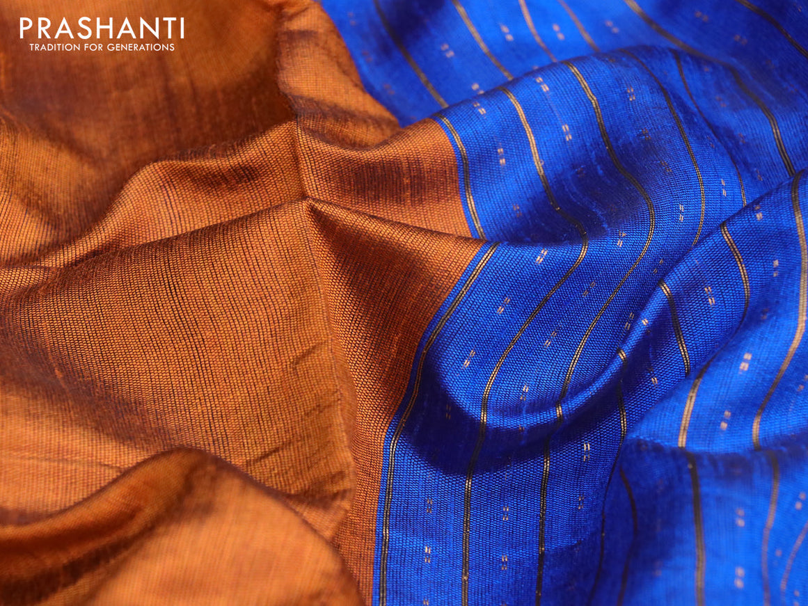 Dupion silk saree rustic orange and royal blue with plain body and temple design zari checked border