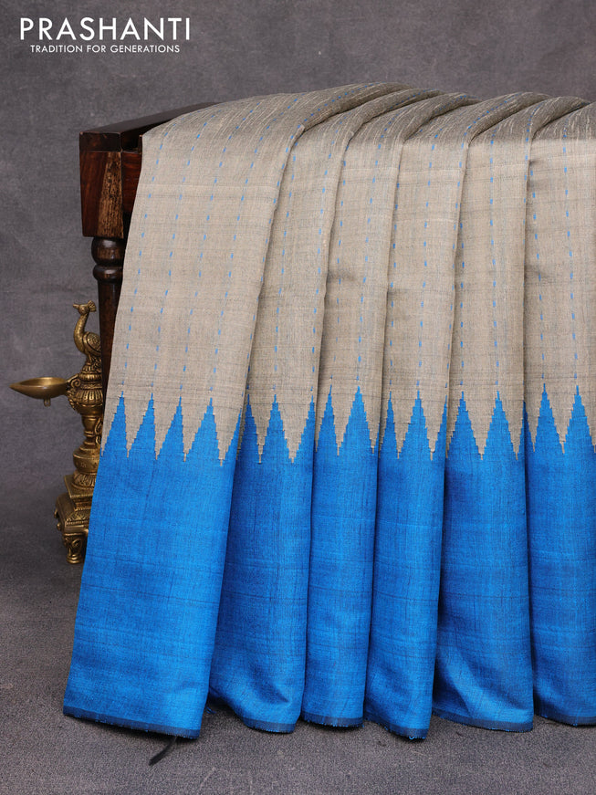 Dupion silk saree grey shade and cs blue with allover thread weaves and temple design woven border