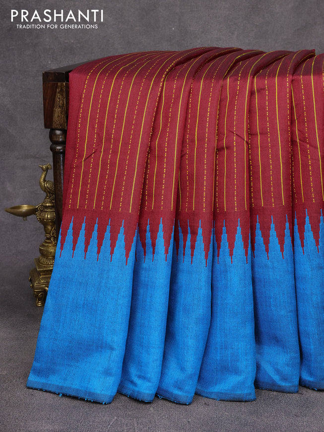 Dupion silk saree maroon and cs blue with allover thread weaves and temple design woven border