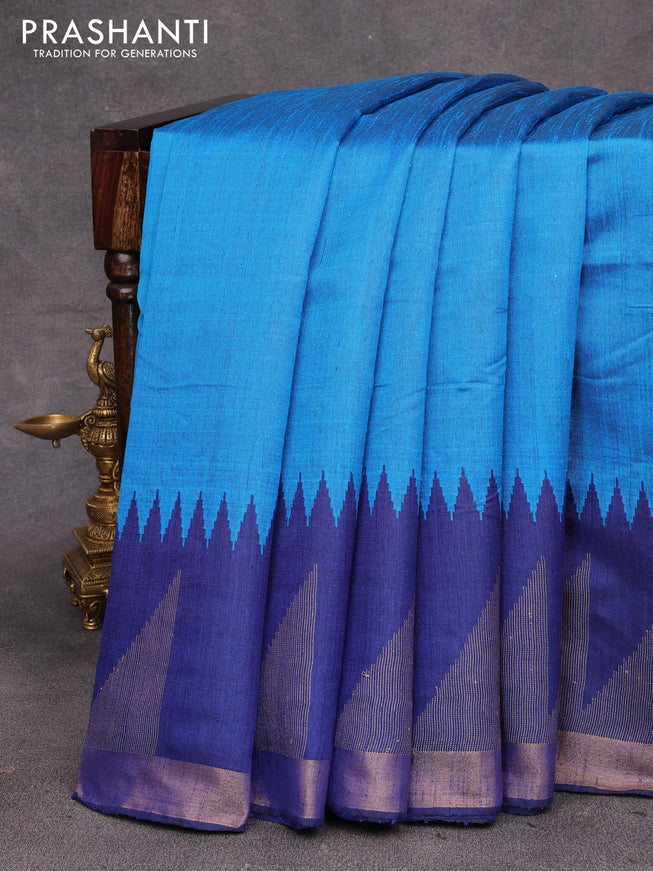 Dupion silk saree cs blue and blue with plain body and temple design zari woven border