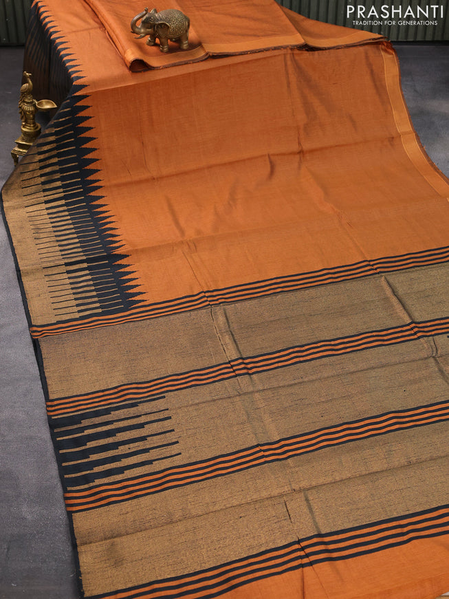 Dupion silk saree honey shade and black with plain body and temple design zari woven border