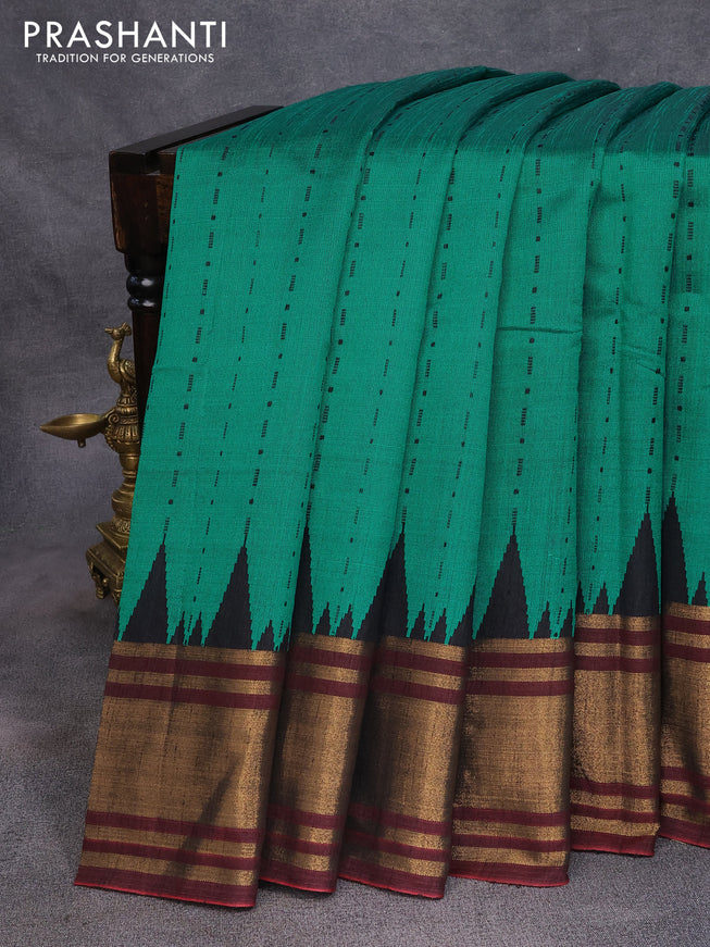 Dupion silk saree teal green and black with allover thread weaves and temple design zari woven border