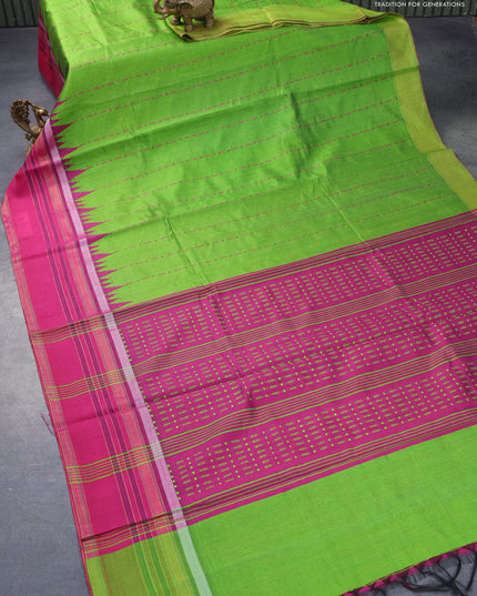 Dupion silk saree green and purple with allover thread weaves and temple design zari woven border